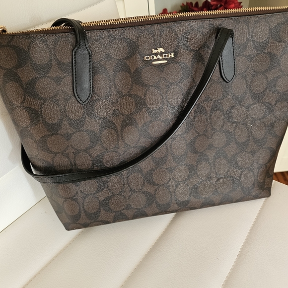 Coach Handbags - Coach Brown and Black Signature Tote Bag